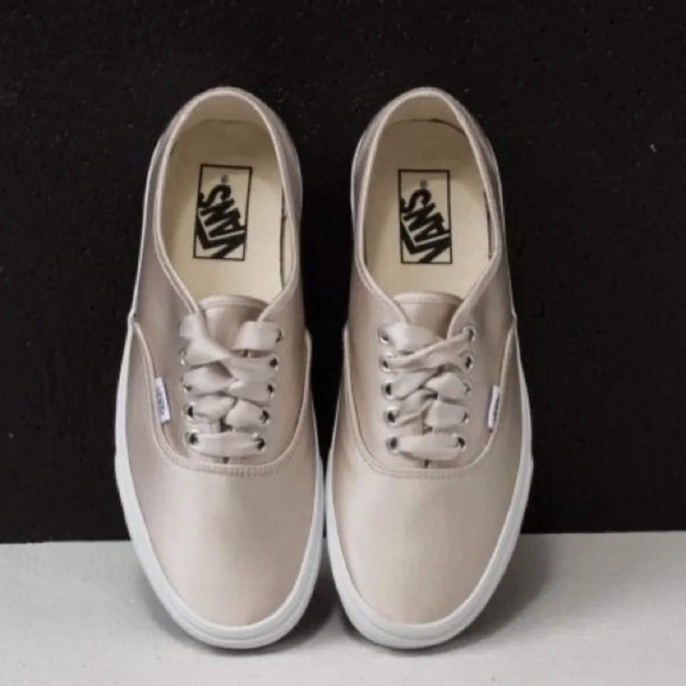 Vans Classic Lace-Up Sneakers in Beige and White